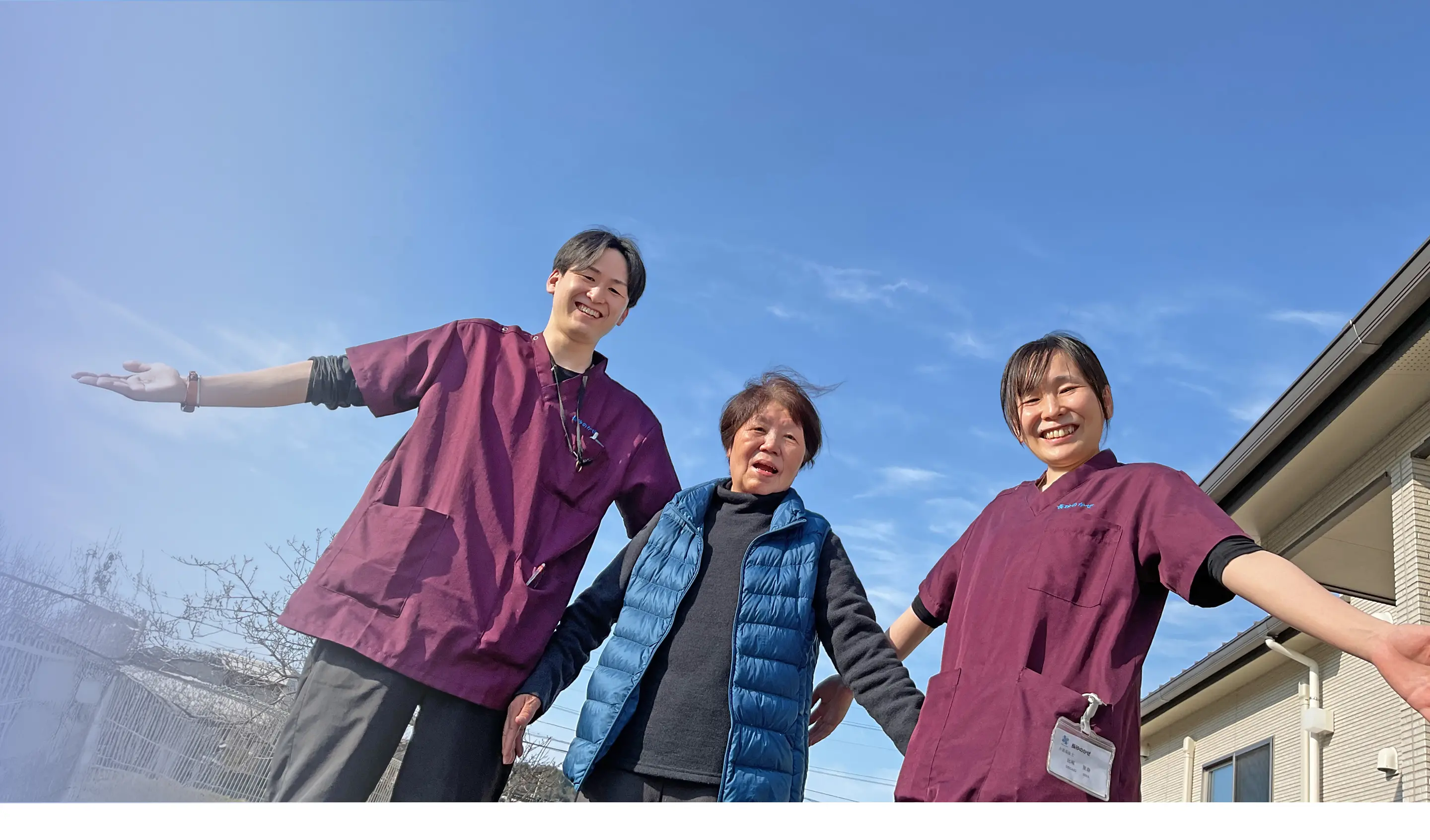 入居者とスタッフの笑顔の写真